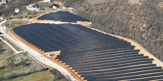 Aerial view of a hillside solar plant